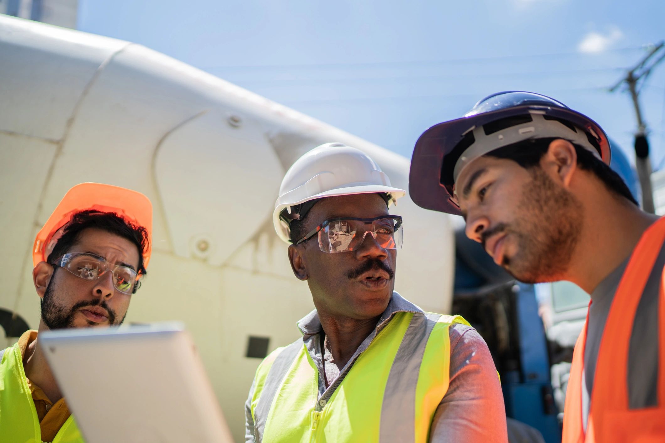 Construction coworkers meeting at a jobsite