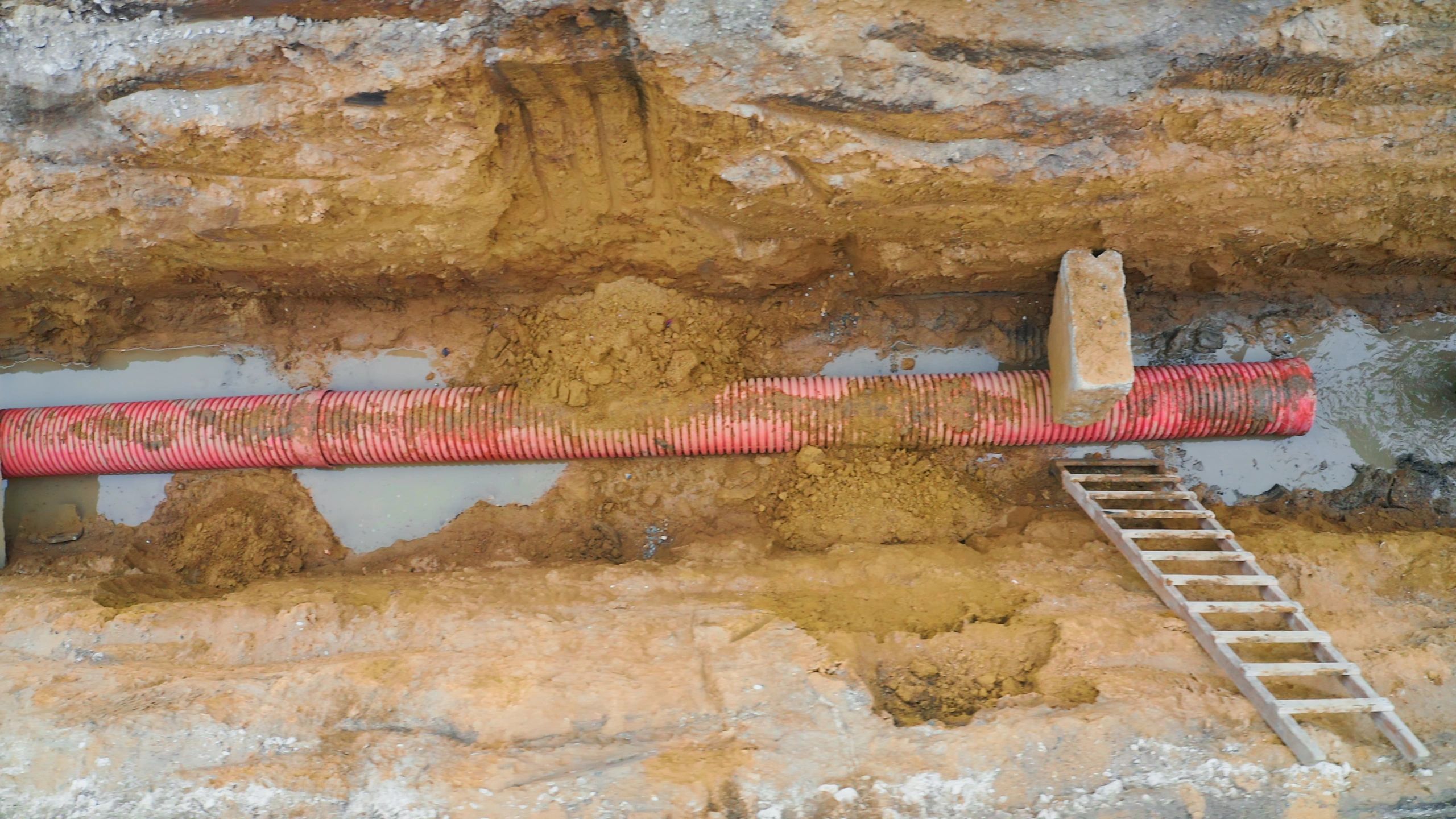 Utility pipe in an excavation trench